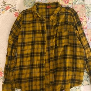 A yellow Charlie Brown button up,fresh from the washer and dryer
